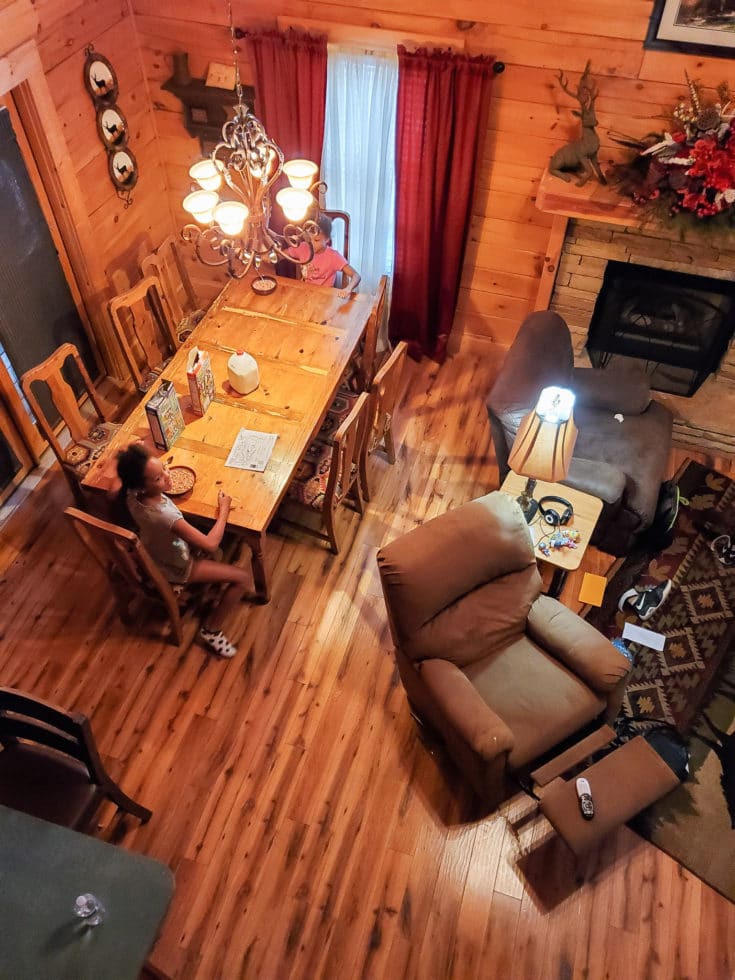 The Mountain Charm Eagles Ridge Resorts Cabin Dining Room. The Mountain Charm 3 Bedroom Cabin at Eagles Ridge Resort offers ample space and luxury. The perfect place to stay during a family vacation to Pigeon Forge, TN.