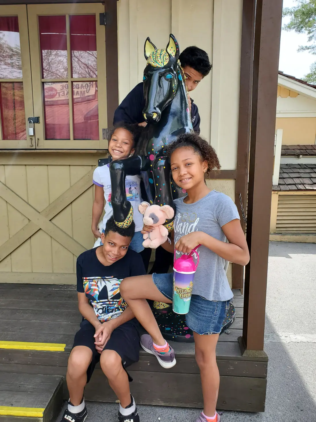 Dollywood Family Shot. My family spent the day playing and eating at the Dollywood theme park, and we are happy to report we had a blast! Read all about our trip and learn why Dollwood is a must visit destination while you are in Pigeon Forge, TN.