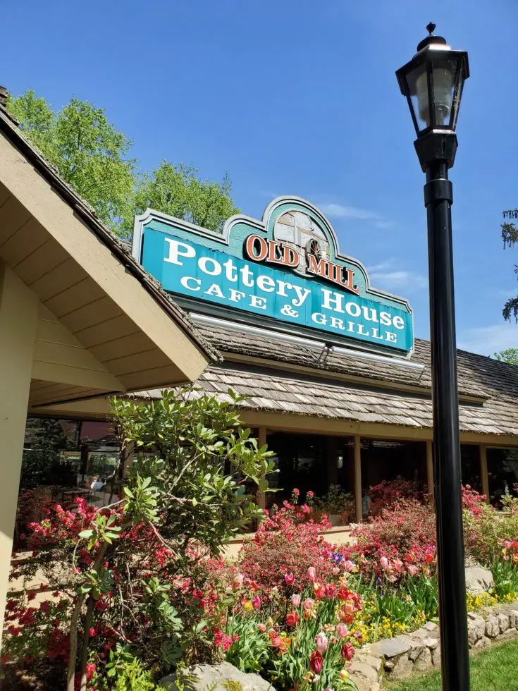 The Old Mill Pottery House Cafe & Grille Sign. The Pottery House Cafe serves freshly made sandwiches, salads, and hearty entrees on dishes created by our potters right next door. Read my full review which includes photos of this beautiful and delicious location in Pigeon Forge, TN.