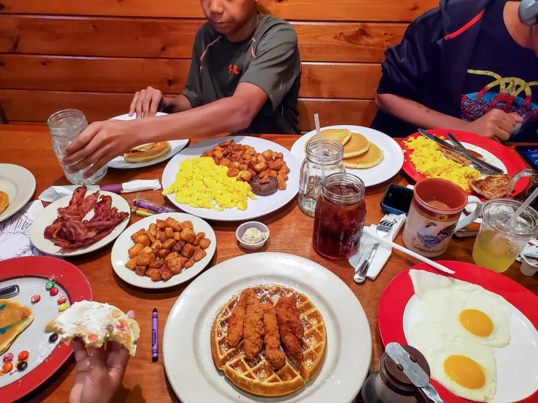 Sawyers Farmhouse Breakfast Table Spread. One of the best farmhouse style breakfasts in town is at Sawyers Farmhouse located in Pigeon Forge, TN. Serving a variety of Breakfast foods including Crepes, Belgium Waffles, Made from Scratch Pancakes, syrups and compotes.