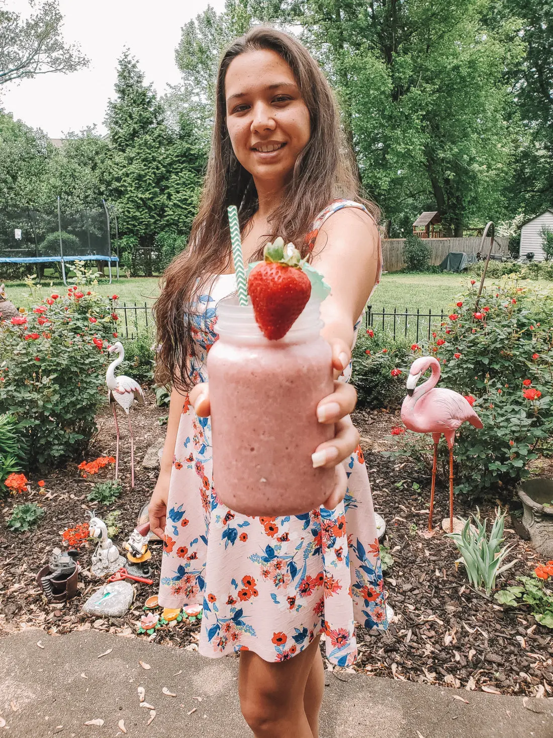 Banana Berry Zinger Smoothie Closeup. The Banana Berry Zinger Smoothie is the perfect spin on your regular smoothie routine. Its packed with fresh fruits and an herbal tea that is out of this world delicious. Read the full recipe on my blog at