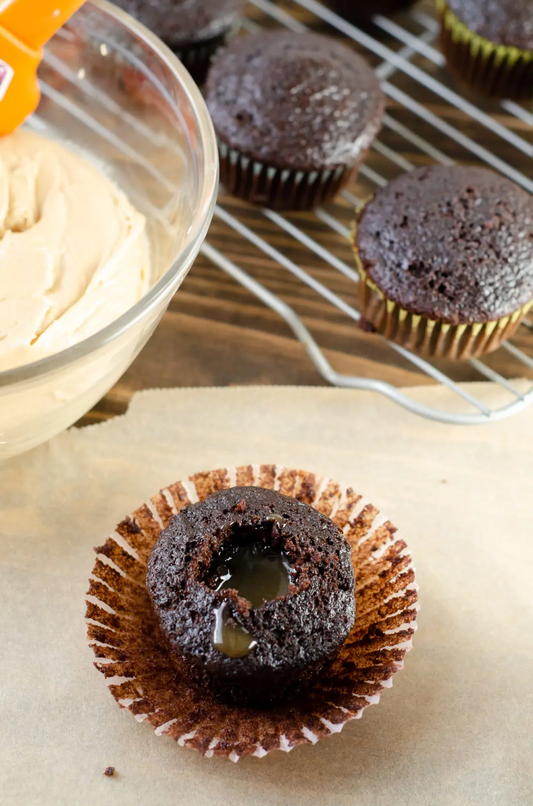 Super Moist Chocolate Cupcakes From Scratch Salted Caramel Frosting With Caramel Filling. Celebrate any occasion with these decadent Super Moist Chocolate Cupcakes From Scratch with Salted Caramel Frosting and Caramel Filled Center. This homemade recipe is so easy to create, the kids can join in.