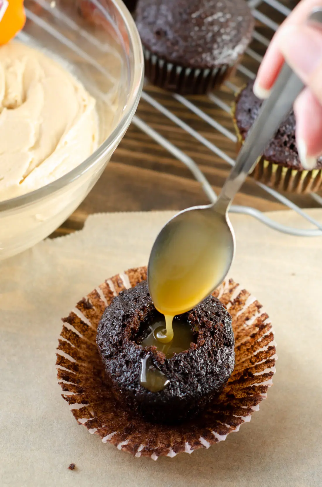Super Moist Chocolate Cupcakes From Scratch Salted Caramel Frosting Adding Caramel Filling. Celebrate any occasion with these decadent Super Moist Chocolate Cupcakes From Scratch with Salted Caramel Frosting and Caramel Filled Center. This homemade recipe is so easy to create, the kids can join in.