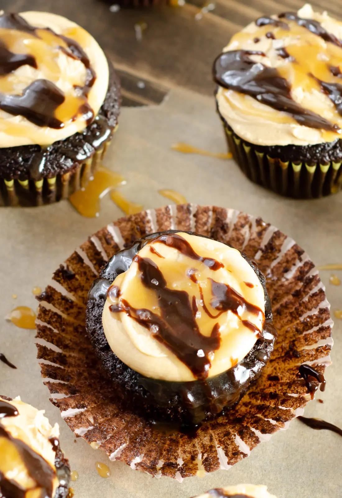 Super Moist Chocolate Cupcakes From Scratch Salted Caramel Frosting Drizilled with caramel. Celebrate any occasion with these decadent Super Moist Chocolate Cupcakes From Scratch with Salted Caramel Frosting and Caramel Filled Center. This homemade recipe is so easy to create, the kids can join in.