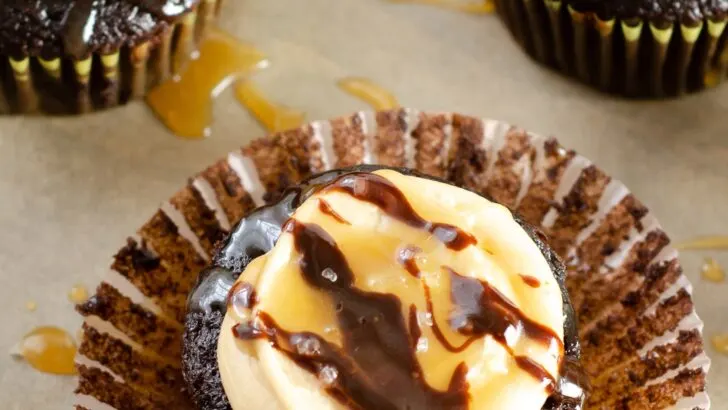 Super Moist Chocolate Cupcakes From Scratch Salted Caramel Frosting Drizilled with caramel. Celebrate any occasion with these decadent Super Moist Chocolate Cupcakes From Scratch with Salted Caramel Frosting and Caramel Filled Center. This homemade recipe is so easy to create, the kids can join in.