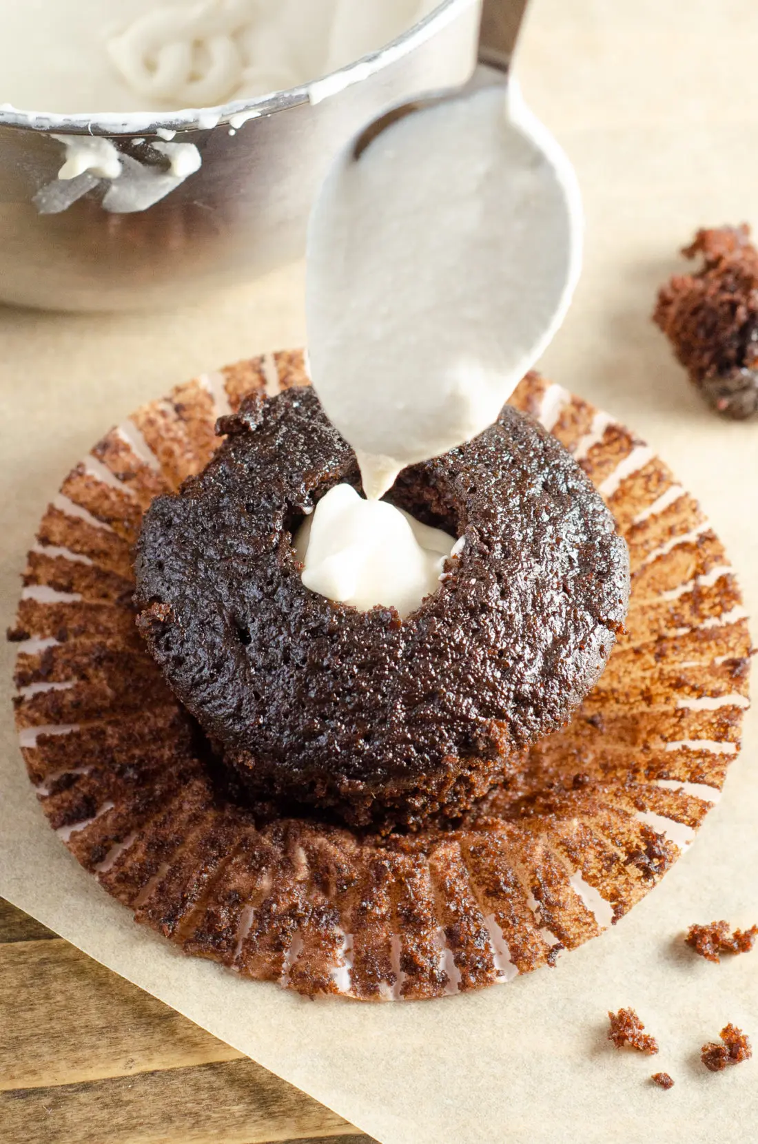 Chocolate Cupcake with Marshmallow Creme Filling Added. Sink your teeth into a childhood favorite cupcake that is as easy to bake as it is to eat. My Chocolate cupcakes with Chocolate Buttercream frosting and marshmallow creme filling will make the kid in you cheer.
