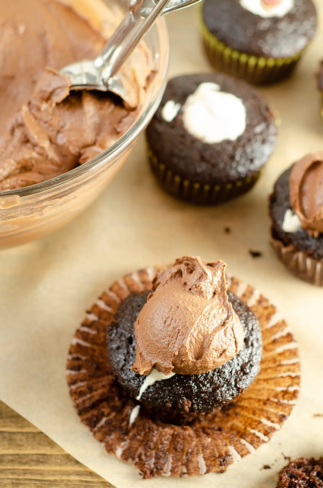 Chocolate Cupcake Marshmallow Filling Chocolate Frosting. Sink your teeth into a childhood favorite cupcake that is as easy to bake as it is to eat. My Chocolate cupcakes with Chocolate Buttercream frosting and marshmallow creme filling will make the kid in you cheer.