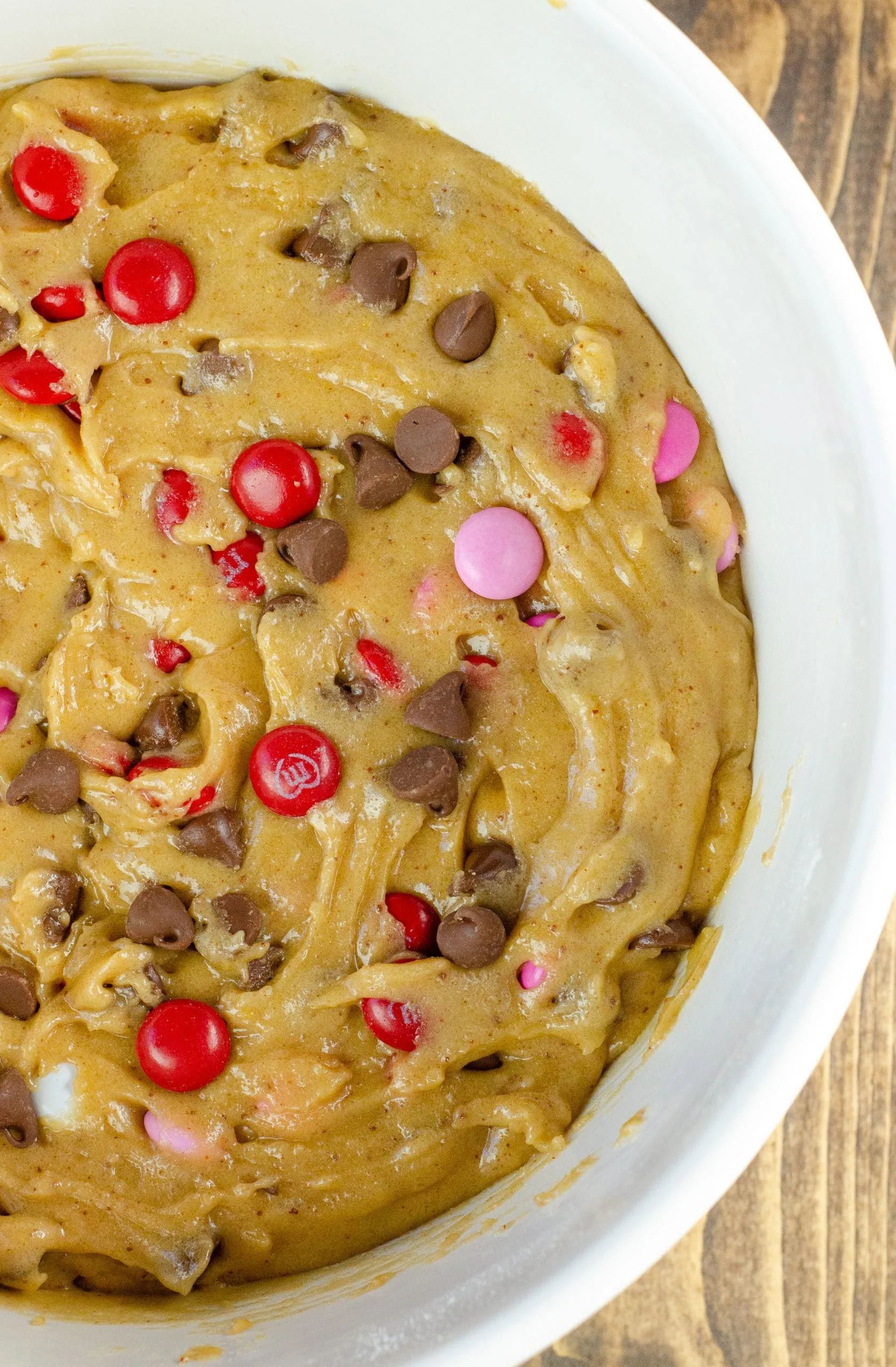 Browned Butter M&M Blondies Dough. These Valentine's day themed Browned Butter M&M Blondies are the perfect way to say I heart you to someone special. I love to bake them for my little ones year-round. They are so chewy and chocolatey they make it easy for me to look like a master dessert chef.