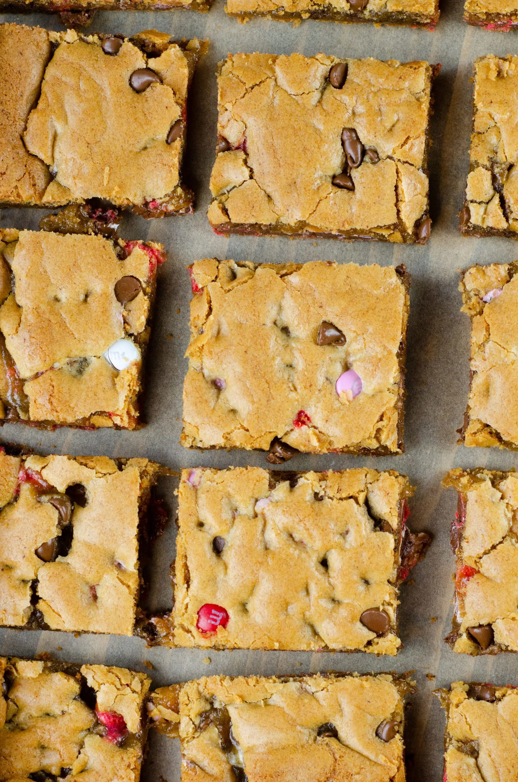 Browned Butter M&M Blondies Bars. These Valentine's day themed Browned Butter M&M Blondies are the perfect way to say I heart you to someone special. I love to bake them for my little ones year-round. They are so chewy and chocolatey they make it easy for me to look like a master dessert chef.