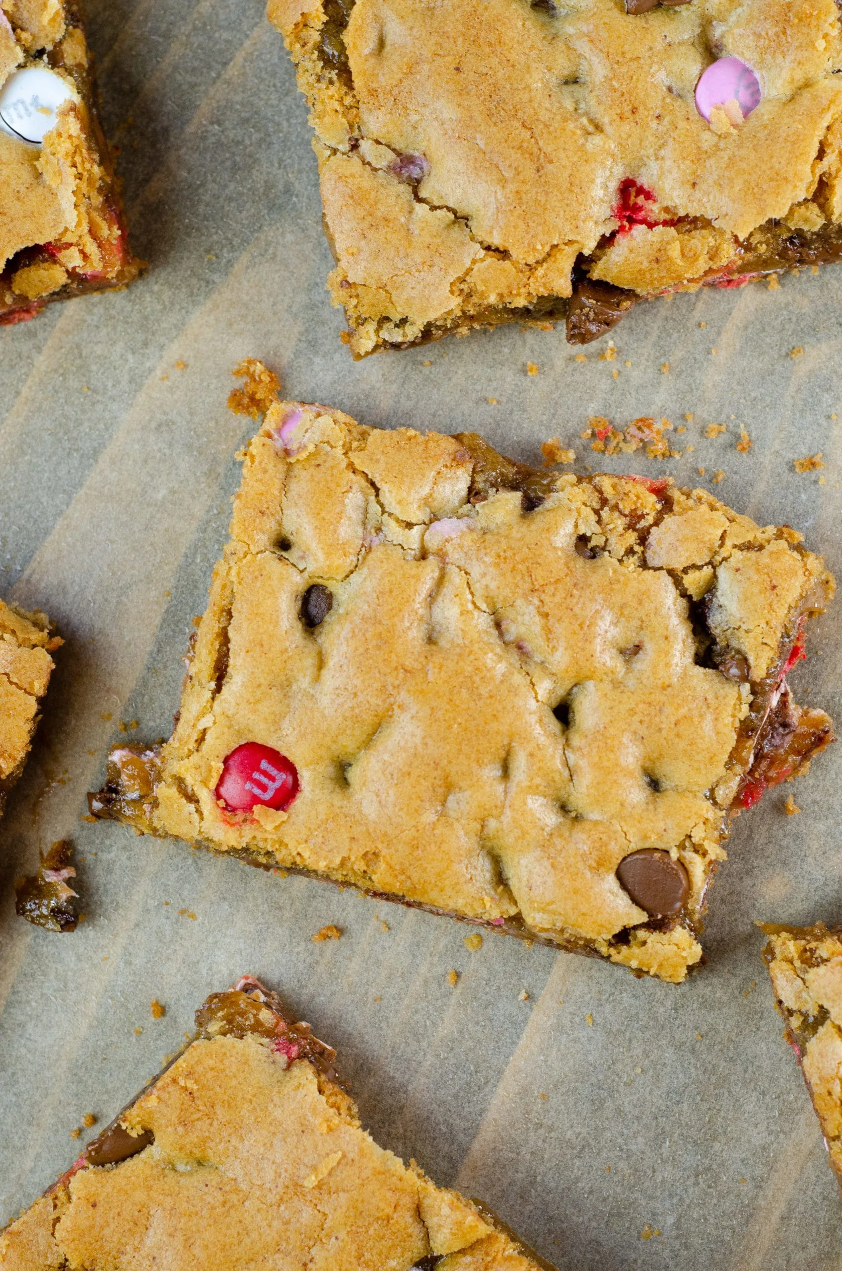 Browned Butter M&M Blondies Bars. These Valentine's day themed Browned Butter M&M Blondies are the perfect way to say I heart you to someone special. I love to bake them for my little ones year-round. They are so chewy and chocolatey they make it easy for me to look like a master dessert chef.