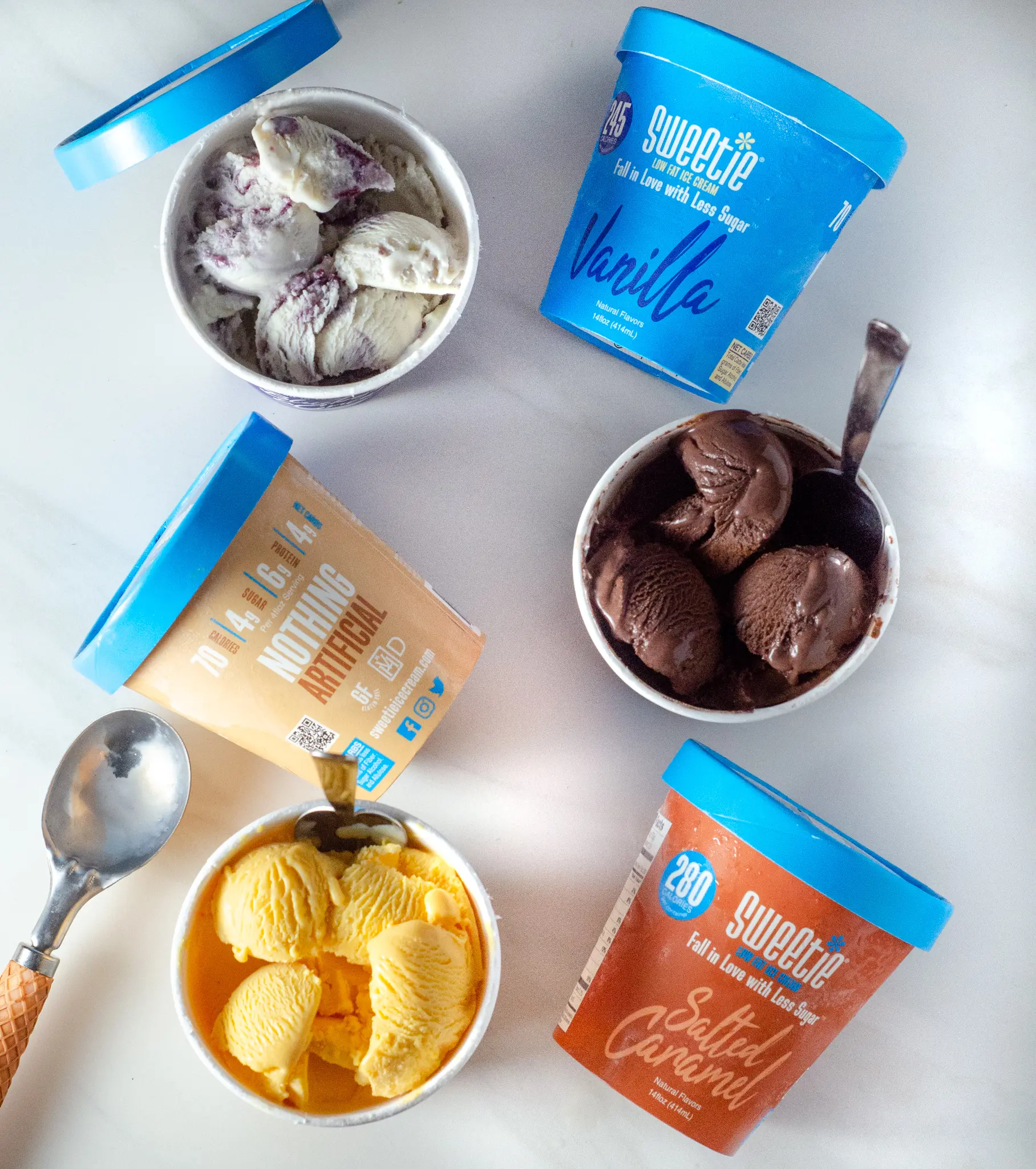 Sweetie Ice Cream Flavors Spoons. Sweetie&reg; Ice cream boasts a wonderful ingredient called DOLCIA PRIMA Allulose, a non-artificial sweetening ingredient that has no unpleasant aftertaste, and provides all the taste, texture, and functionality of sugar with 90% fewer calories!