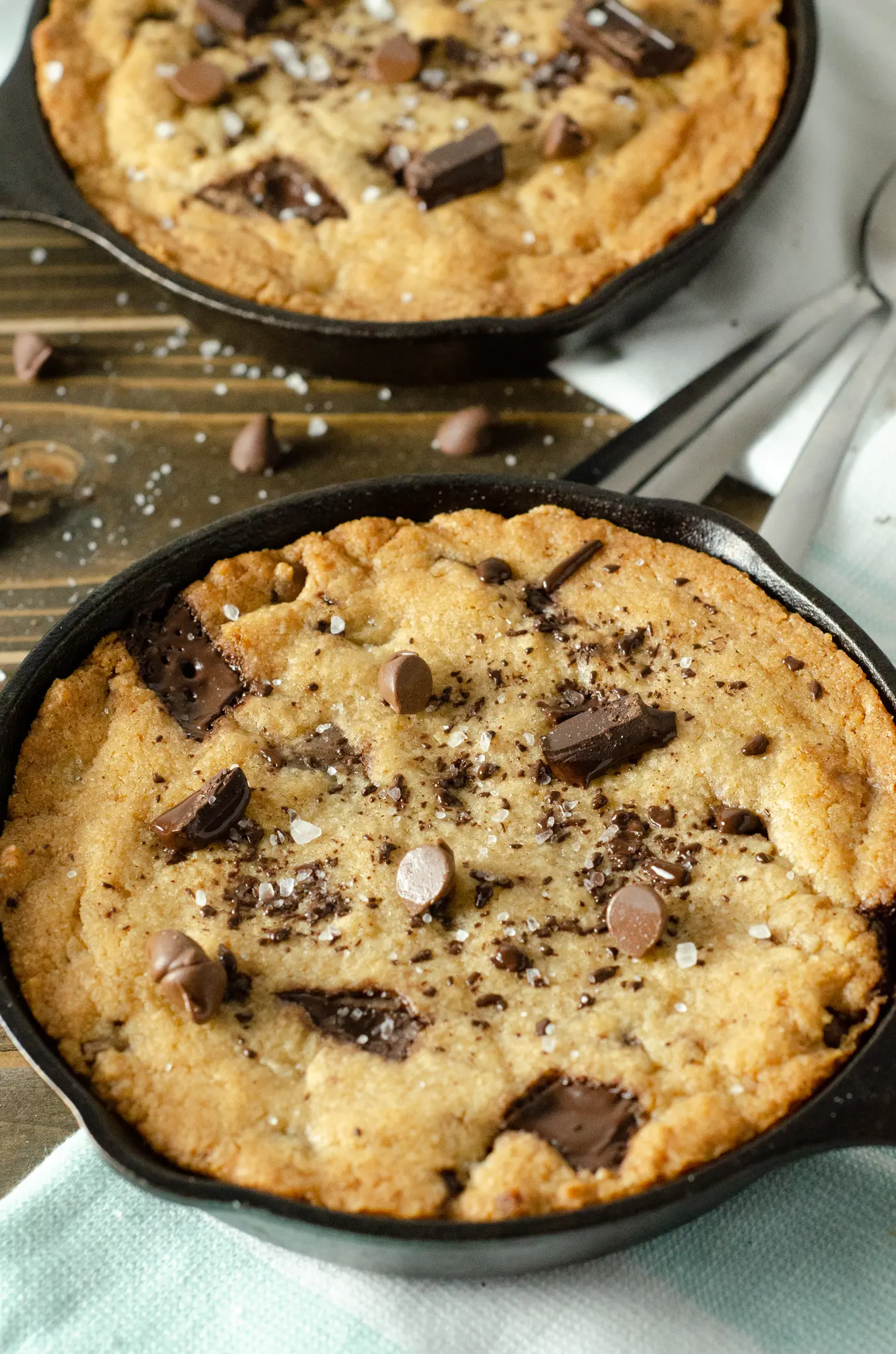 Chocolate Chip Skillet Cookie in Skillet. This brown butter Chocolate Chip Skillet Cookie is packed with chunks of chocolate and topped with sea salt, it's the perfect dessert for two. The insanely soft center and crispy buttery edges will have you falling in love with this easy pizookie recipe.