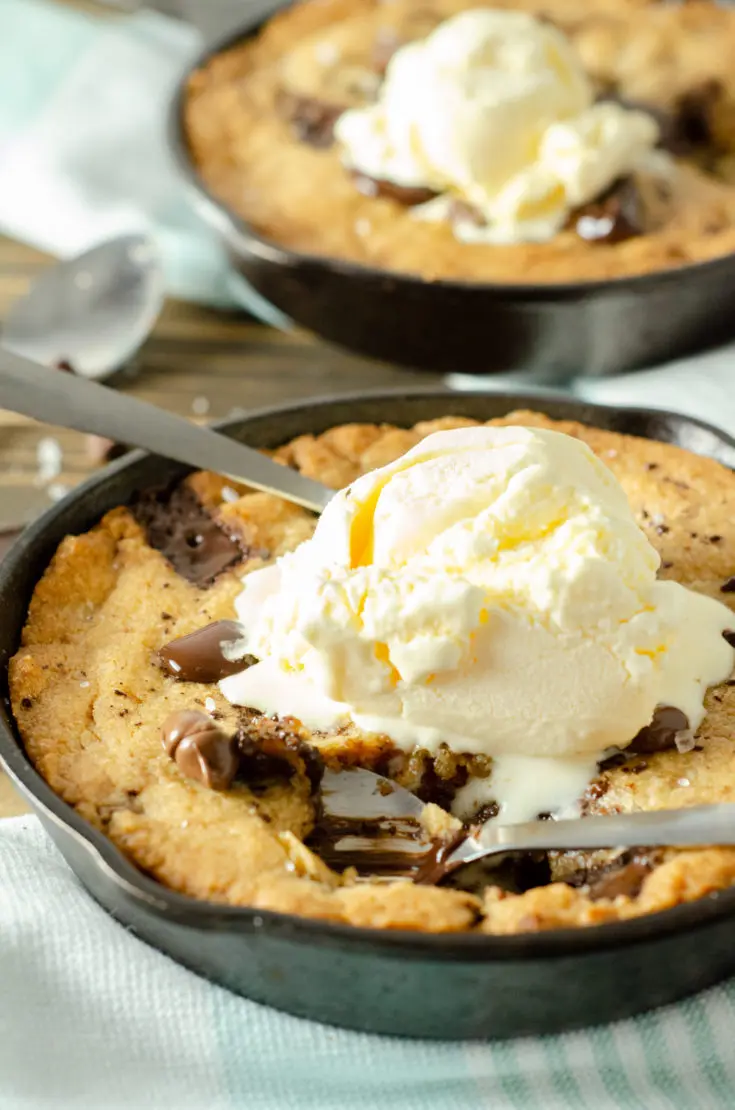 Chocolate Chip Skillet Cookie Ice Cream. This brown butter Chocolate Chip Skillet Cookie is packed with chunks of chocolate and topped with sea salt, it's the perfect dessert for two. The insanely soft center and crispy buttery edges will have you falling in love with this easy pizookie recipe.