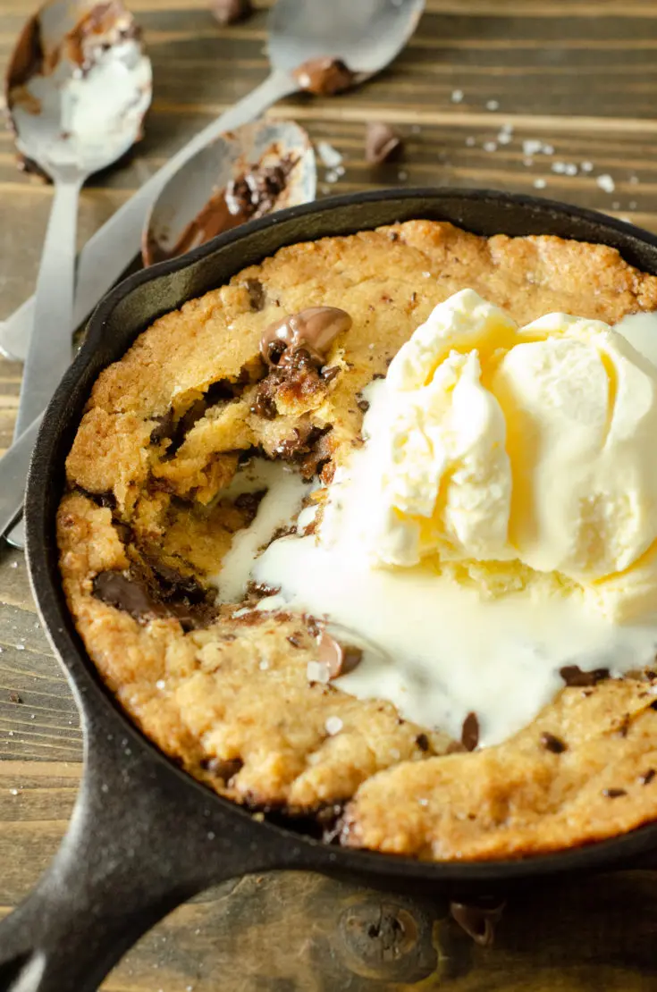 Chocolate Chip Skillet Cookie with Vanilla Ice Cream. This brown butter Chocolate Chip Skillet Cookie is packed with chunks of chocolate and topped with sea salt, it's the perfect dessert for two. The insanely soft center and crispy buttery edges will have you falling in love with this easy pizookie recipe. 