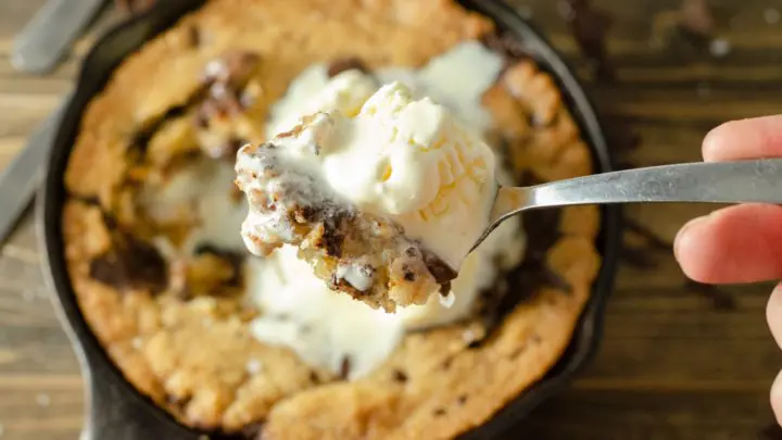 Chocolate Chip Skillet Cookie Scoop Ice Cream. This brown butter Chocolate Chip Skillet Cookie is packed with chunks of chocolate and topped with sea salt, it's the perfect dessert for two. The insanely soft center and crispy buttery edges will have you falling in love with this easy pizookie recipe. 