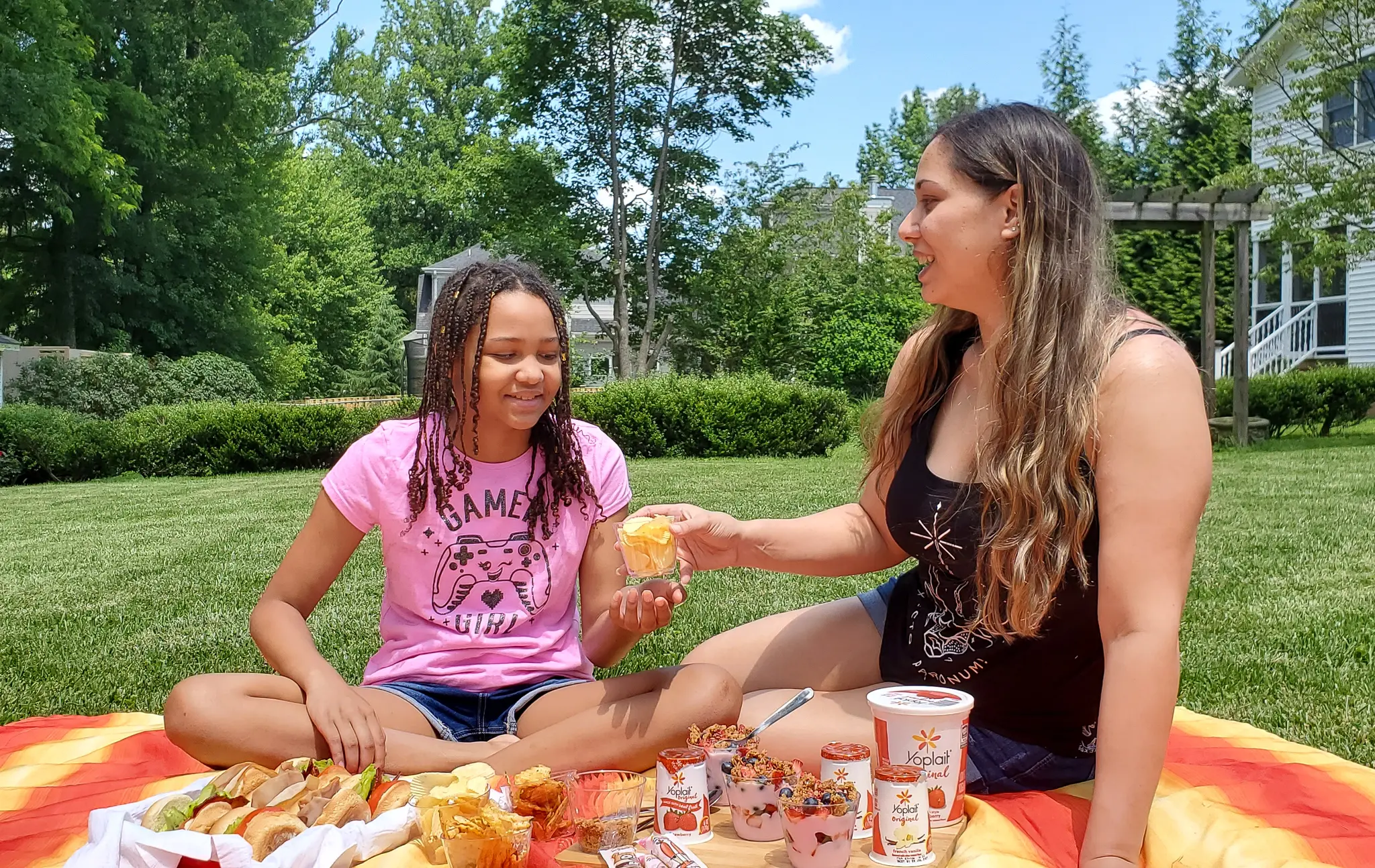 Backyard Picnic with Yoplait Mom and Daughter. Grab your picnic baskets! It&rsquo;s time to host your very own backyard picnic featuring the foods your family loves. No need to leave home for this bunch of fun, just pick a date and then prep your picnic baskets.