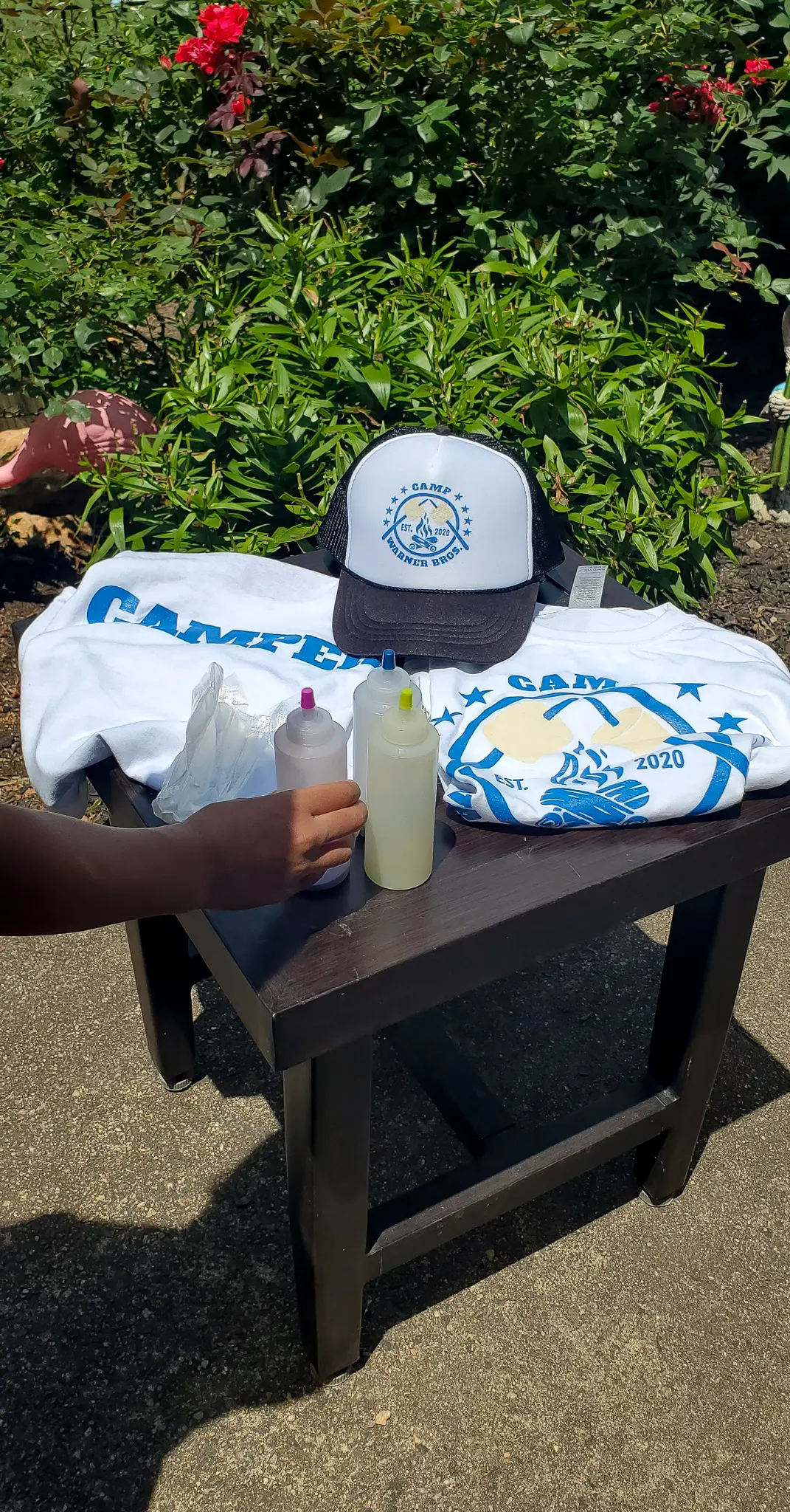 Camper Warner Bros. Tie-Dye Camper Shirts Step 1. Join us as we adventure through 8 weeks of Virtual Camp Warner Bros. Each week will feature a new fun family friendly activity and a Warner Bros. Show or Movie. This week featured a Camper Shirt Tie-Dye activity.