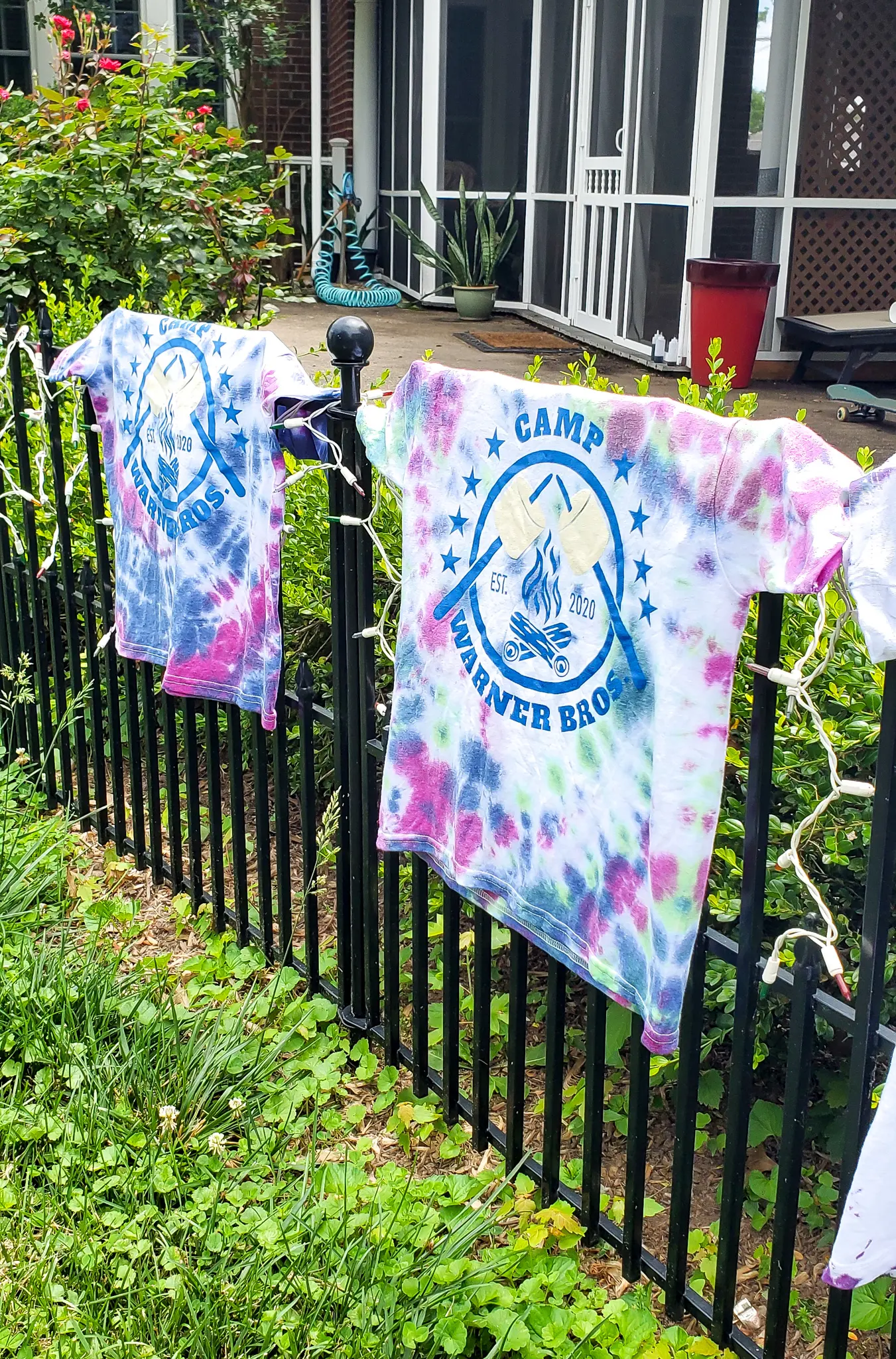 Camper Warner Bros. Tie-Dye Camper Shirts Drying. Join us as we adventure through 8 weeks of Virtual Camp Warner Bros. Each week will feature a new fun family friendly activity and a Warner Bros. Show or Movie. This week featured a Camper Shirt Tie-Dye activity.