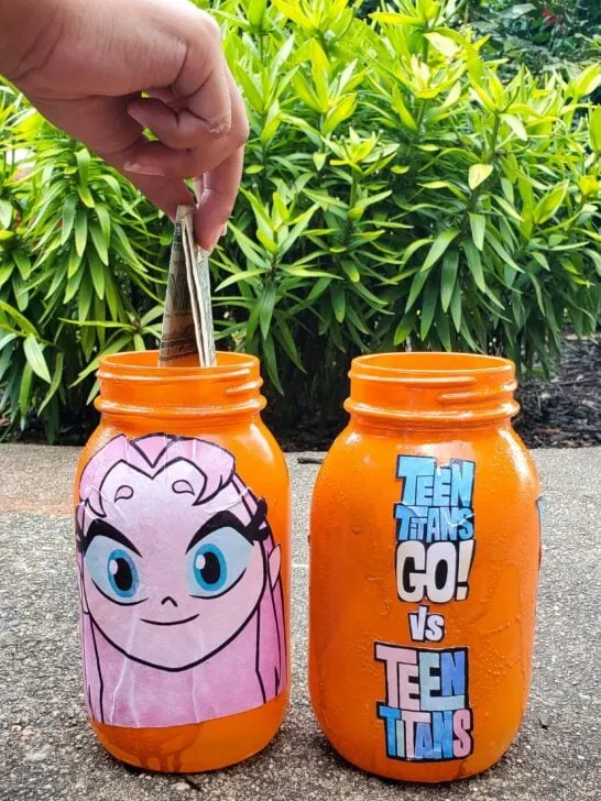 Teen Titans Go!&nbsp;Character Banks It&rsquo;s week 5 at Camp Warner Bros.! It's time to get crafty with this week's activity Teen Titans Go! Vs. Teen Titans Character Banks. Grab your printables on my blog, along with some more supplies to create your very own Teen Titans Go! vs Teen Titans Character Banks.