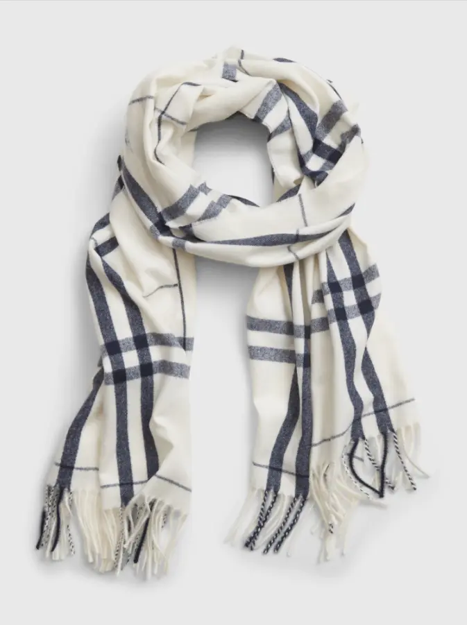 GAP Fall Faves Cozy Scarf. The name says it all! This Cozy Scarf offers a soft knit material with a fringe at the edge. Keep warm all fall with this fashionable scarf. Wear it compliment your wardrobe or as a statement piece with a puffy jacket.