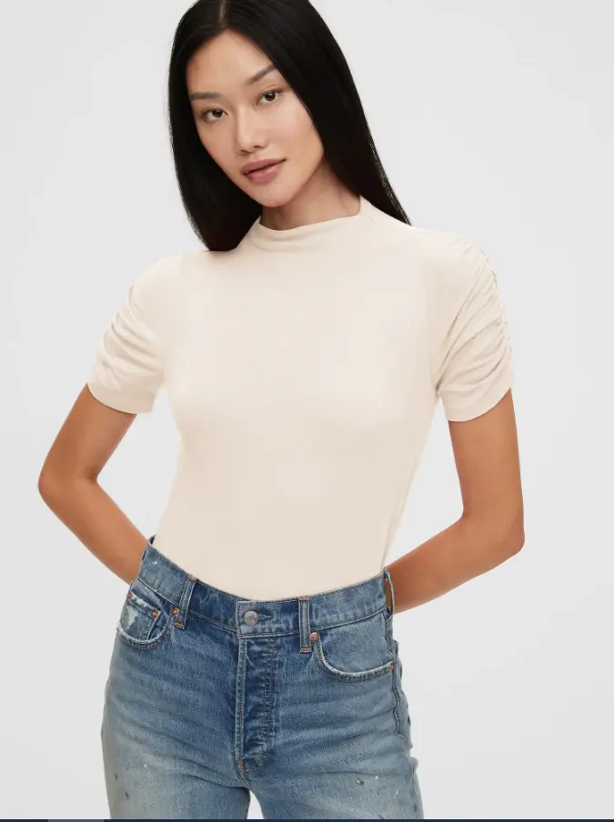 GAP Fall Faves Shirred Short Sleeve T-Shirt. This&nbsp;Shirred Short Sleeve T-Shirt&nbsp;comes in three different colors, true black, oyster beige, and faded pink rose.&nbsp; The perfect stylish shirt that you can layer under your favorite cardigan or jacket. Pair it with your favorite jeans, or stylish slacks, or cargo jumpers, the outfit possibilities are endless.