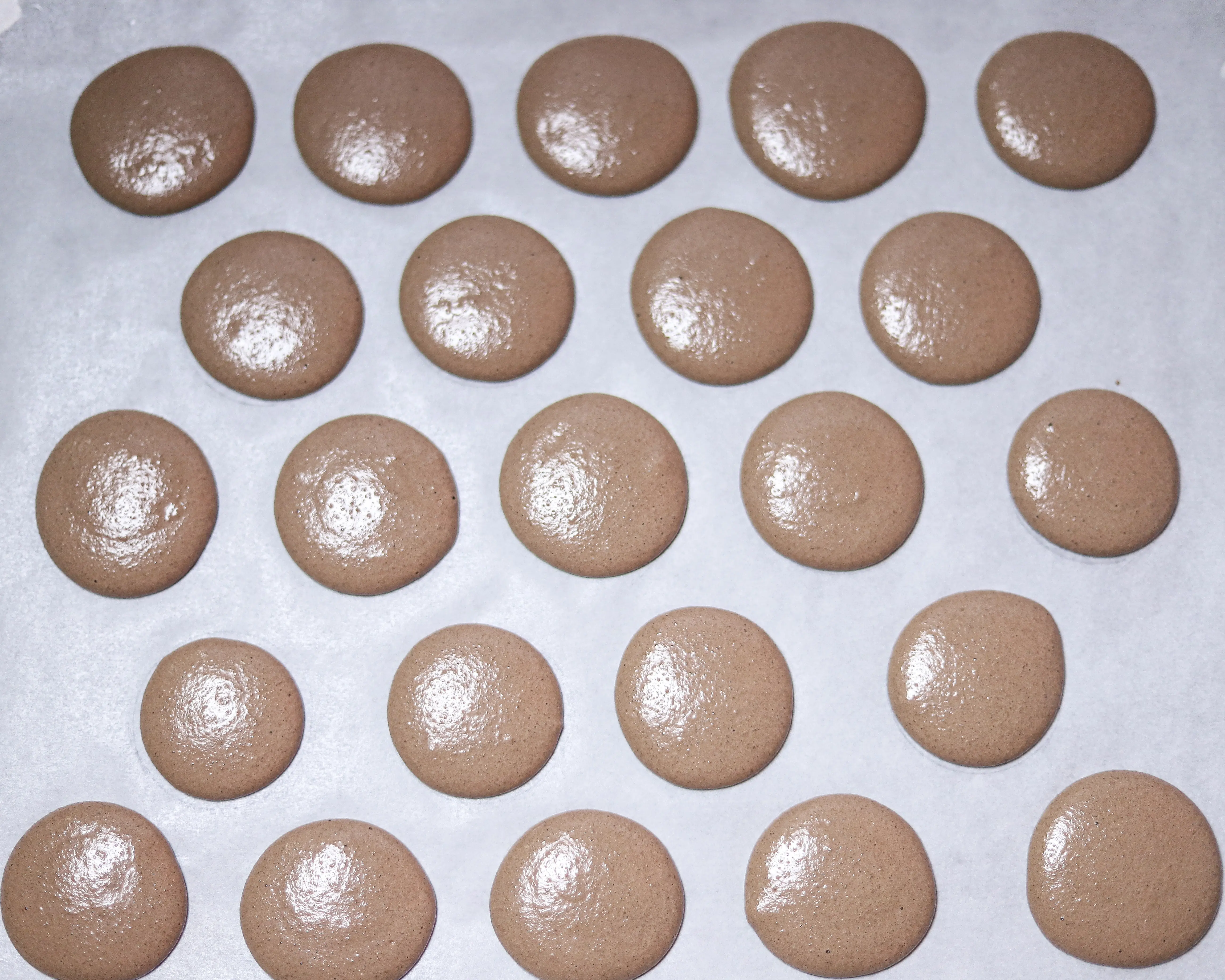 Chocolate Macarons with Salted Caramel Filling in pan. These Chocolate Macarons with Salted Caramel Filling are a delight, so soft and full of flavor. Perfect for entertaining as well as sweet treat gifts to loved ones during the holidays.&nbsp;