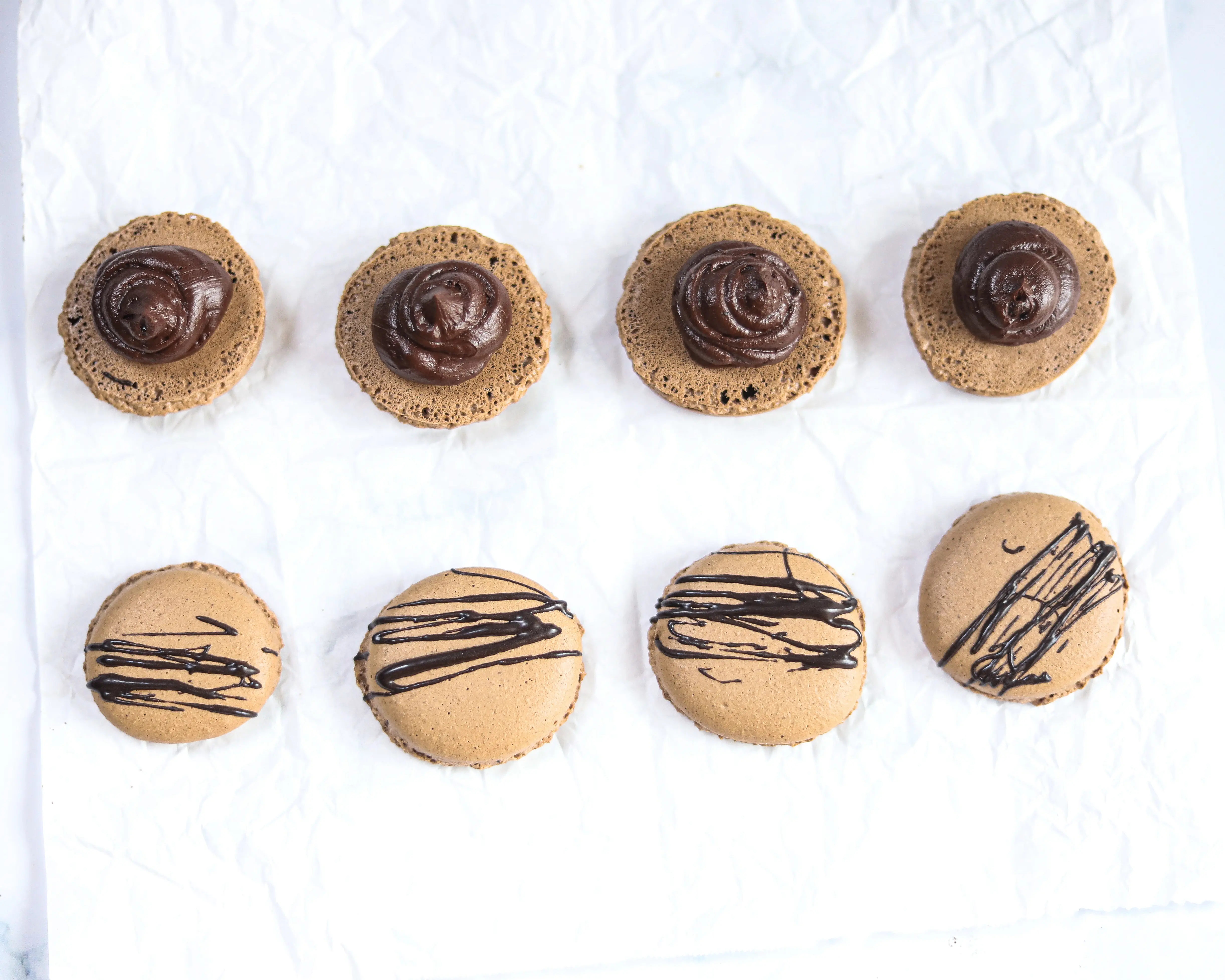 Chocolate Macarons with Salted Caramel Filling Being Filled. These Chocolate Macarons with Salted Caramel Filling are a delight, so soft and full of flavor. Perfect for entertaining as well as sweet treat gifts to loved ones during the holidays.&nbsp;
