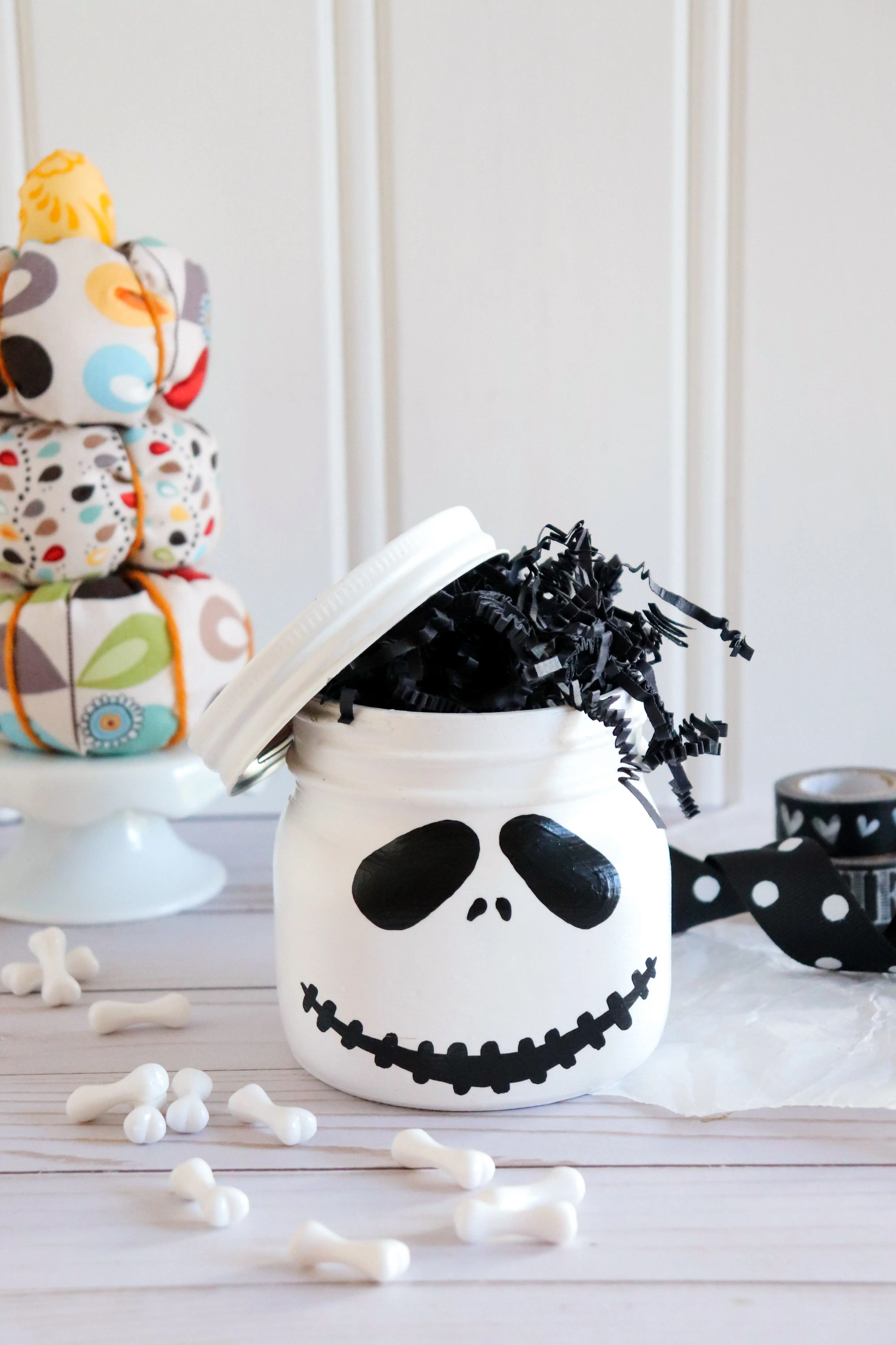 Jack Skellington Mason Jar. This Jack Skellington Mason Jar Halloween Craft is the perfect way to creep your way into the Halloween season. Fill it with your favorite candies and treats, it's the perfect Halloween Craft that you can keep or gift.