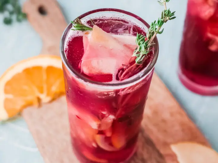 Sparkling Red Wine Sangria Garnish. Celebrate any occasion with this festive Sparkling Red Wine Sangria, made with fresh cut oranges, apples, red wine, and more! This festive fruit-infused Sparkling Sangria is an easy make-ahead cocktail that is perfect for large and small gatherings.