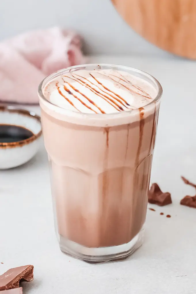 Slow Cooker Salted Caramel Hot Chocolate Closeup. Silky smooth, creamy and decadent, this Instant Pot Salted Caramel Hot Chocolate is an instant family favorite. Made in either the Instant Pot or Slow Cooker this festive holiday drink is perfect for any occasion.
