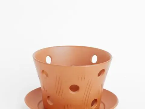 This is a perfect starter pot for an orchid. Orchids thrive in most soil but you never want them to be sitting in water. The carefully placed holes all around our orchid pots allow the air to reach the roots. It is thrilling when you see healthy lime green roots peeking through the holes!
