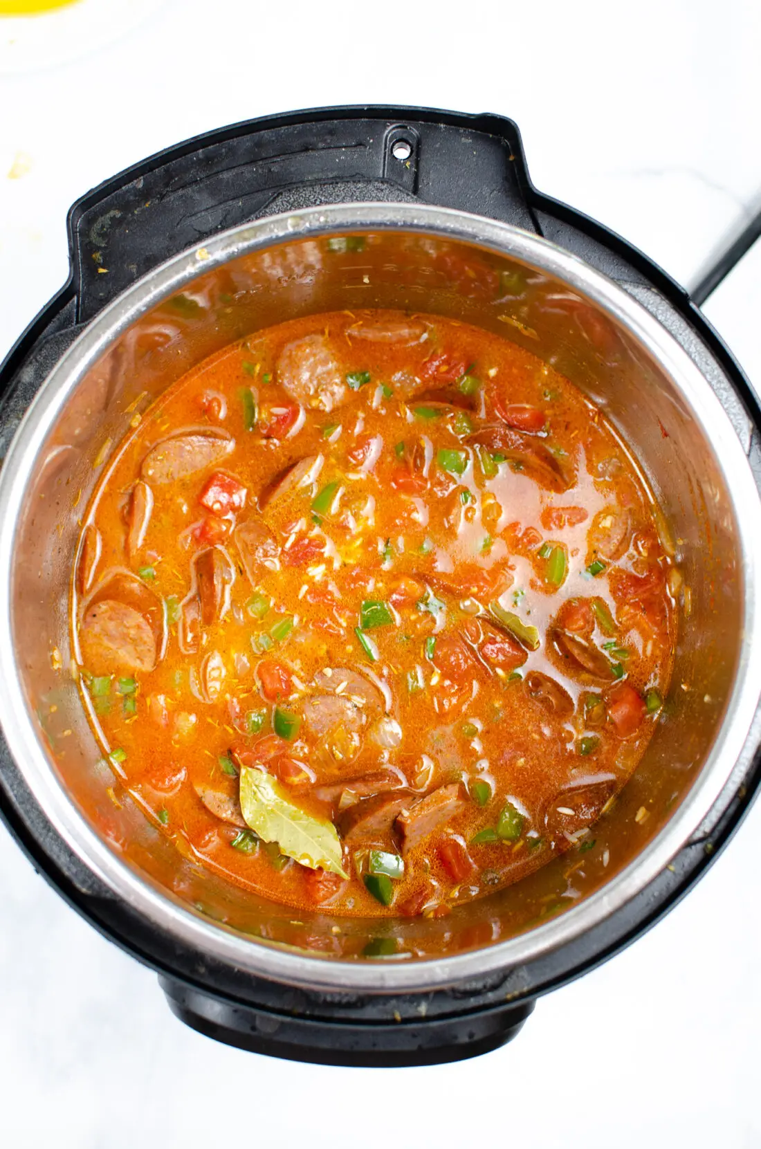 Instant Pot Andouille Sausage Jambalaya Step 7. An authentic Instant Pot Andouille Sausage Jambalaya recipe that can be made in 30 minutes! This flavorful easy one-pan jambalaya recipe is made with andouille sausage, bell peppers, onion, celery, and spices. It's an instant family favorite recipe that is perfect for busy nights.