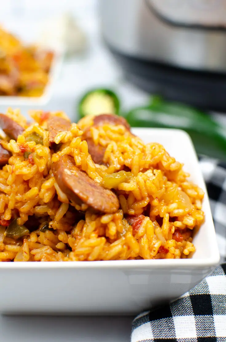 Instant Pot Andouille Sausage Jambalaya Recipe. An authentic Instant Pot Andouille Sausage Jambalaya recipe that can be made in 30 minutes! This flavorful easy one-pan jambalaya recipe is made with andouille sausage, bell peppers, onion, celery, and spices. It's an instant family favorite recipe that is perfect for busy nights.