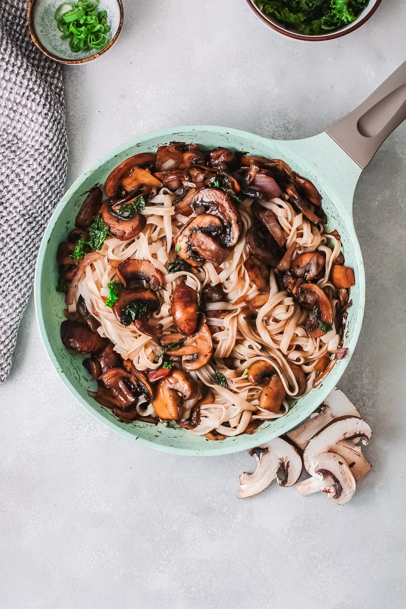 Vegetarian Korean Noodle Cooked in Pan. This simple and easy Vegetarian Korean Noodles dish is full of flavor and can be made in under 30 minutes. The Korean noodles are stir-fried in a savory sauce made with fresh vegetables such as mushrooms, red onion, ginger, garlic, and kale.