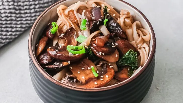 Vegetarian Korean Noodles. This simple and easy Vegetarian Korean Noodles dish is full of flavor and can be made in under 30 minutes. The Korean noodles are stir-fried in a savory sauce made with fresh vegetables such as mushrooms, red onion, ginger, garlic, and kale.