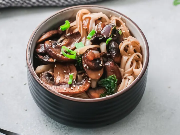 Easy Vegetarian Korean Noodle Recipe. This simple and easy Vegetarian Korean Noodles dish is full of flavor and can be made in under 30 minutes. The Korean noodles are stir-fried in a savory sauce made with fresh vegetables such as mushrooms, red onion, ginger, garlic, and kale.