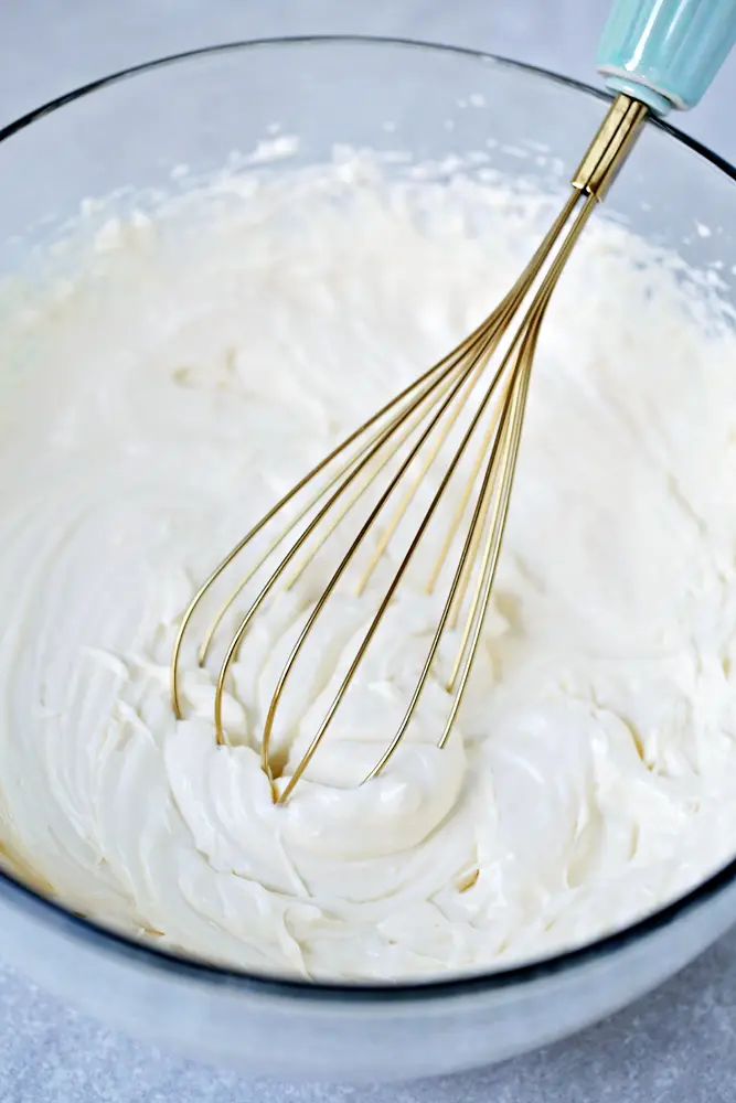 Red Velvet Cheesecake Step 2. This beautiful 2 layered Red Velvet Cheesecake is made with a moist red velvet cake and a smooth, creamy cheesecake layer on the top. It's as if a cake and cheesecake had a baby, both layers made with love and topped with a cream cheese frosting.