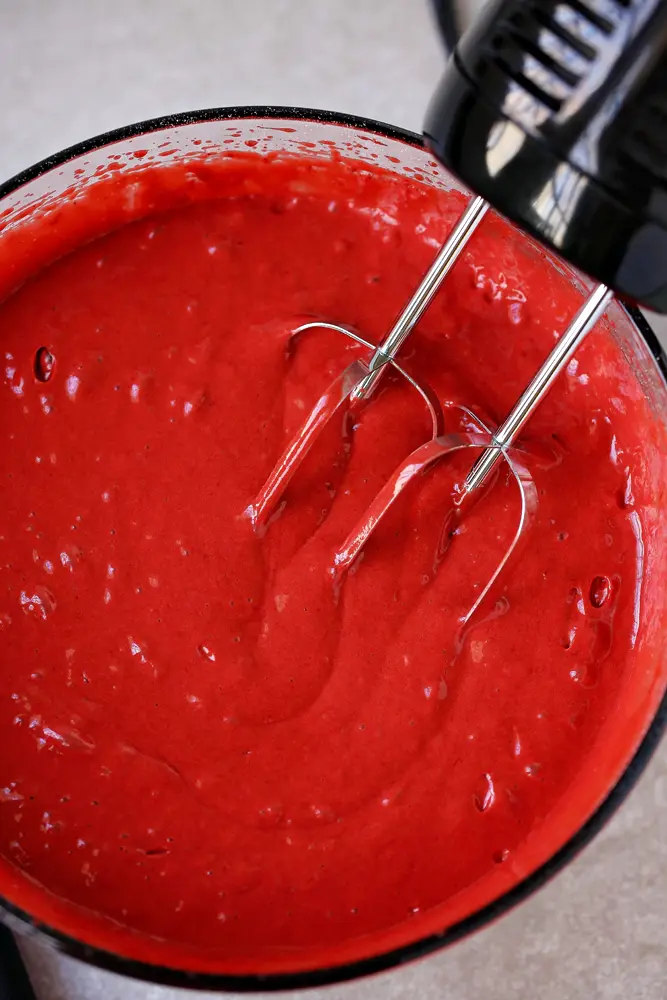 Red Velvet Cheesecake Step 5. This beautiful 2 layered Red Velvet Cheesecake is made with a moist red velvet cake and a smooth, creamy cheesecake layer on the top. It's as if a cake and cheesecake had a baby, both layers made with love and topped with a cream cheese frosting.