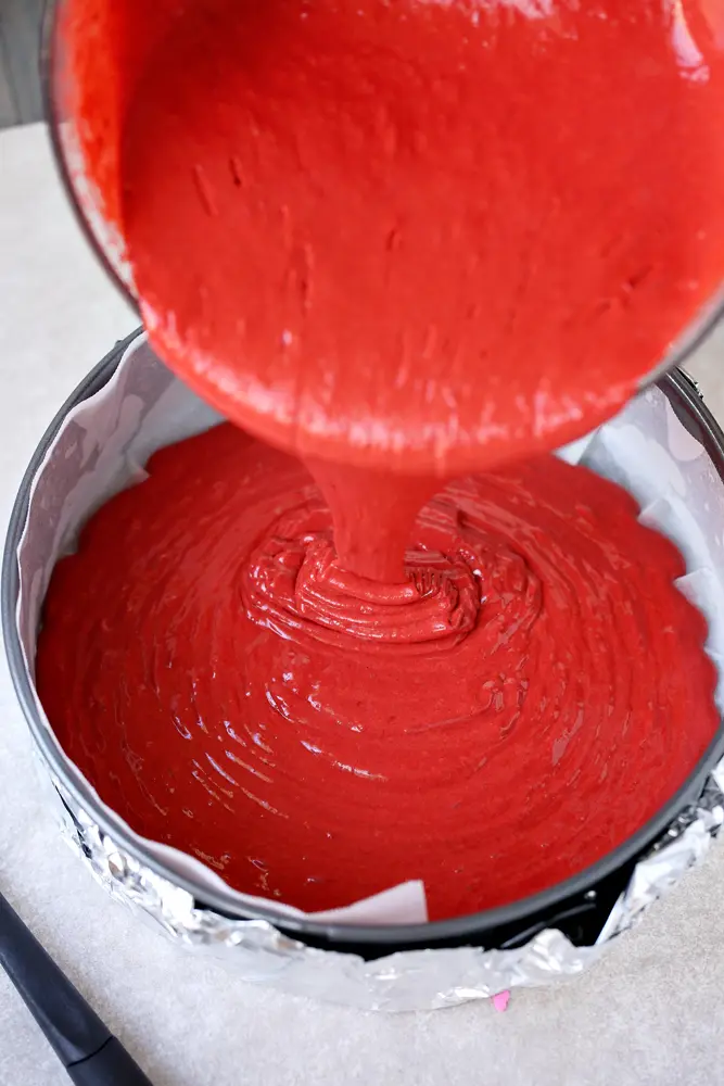 Red Velvet Cheesecake Step 6. This beautiful 2 layered Red Velvet Cheesecake is made with a moist red velvet cake and a smooth, creamy cheesecake layer on the top. It's as if a cake and cheesecake had a baby, both layers made with love and topped with a cream cheese frosting.