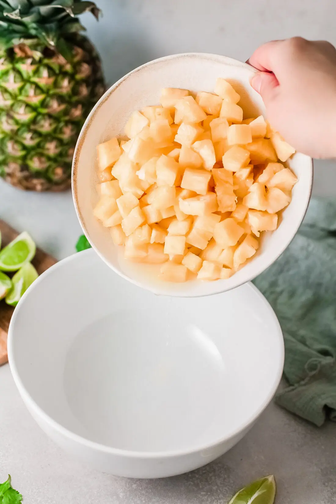 A fresh and simple pineapple salsa recipe that goes great with tacos and tortilla chips. Made with fresh-cut pineapple, peppers, onions, lime juice, and cilantro. It's an easy-to-make dip recipe that pairs well with other summertime recipes.