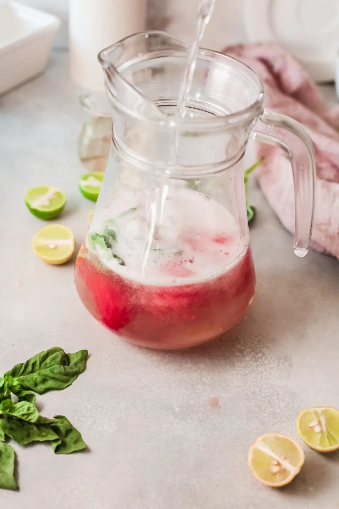 Enjoy this refreshing Sparkling Watermelon Juice on a hot summer day. Made with fresh ingredients, including watermelon and basil leaves, It's the perfect summer drink.