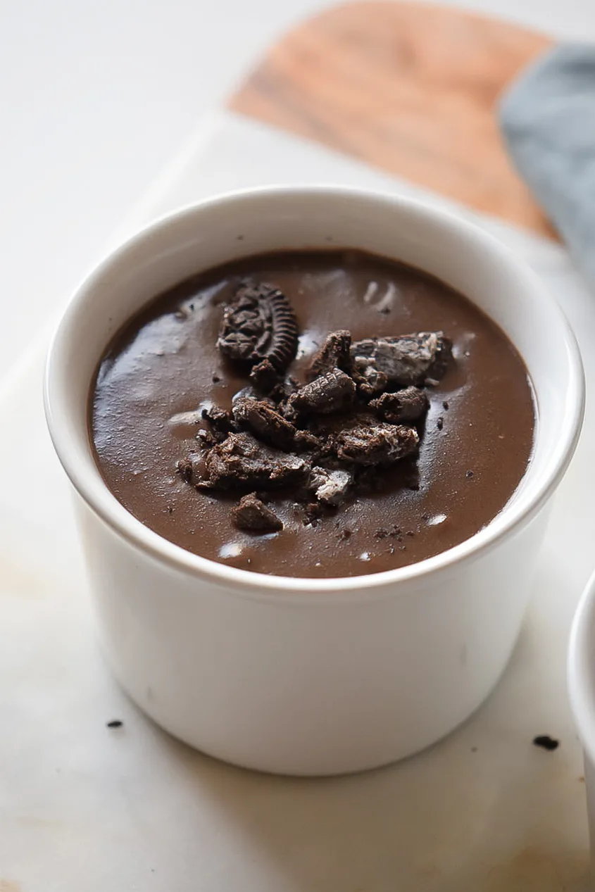 Better than boxed pudding, this easy homemade chocolate pudding is made with a few simple ingredients, plus a special ingredient, crushed cookies. Use this pudding recipe for pie filling and frozen pudding pops!