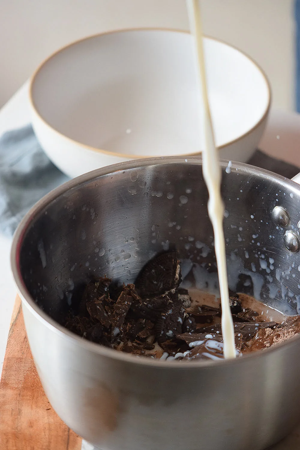 Better than boxed pudding, this easy homemade chocolate pudding is made with a few simple ingredients, plus a special ingredient, crushed cookies. Use this pudding recipe for pie filling and frozen pudding pops!
