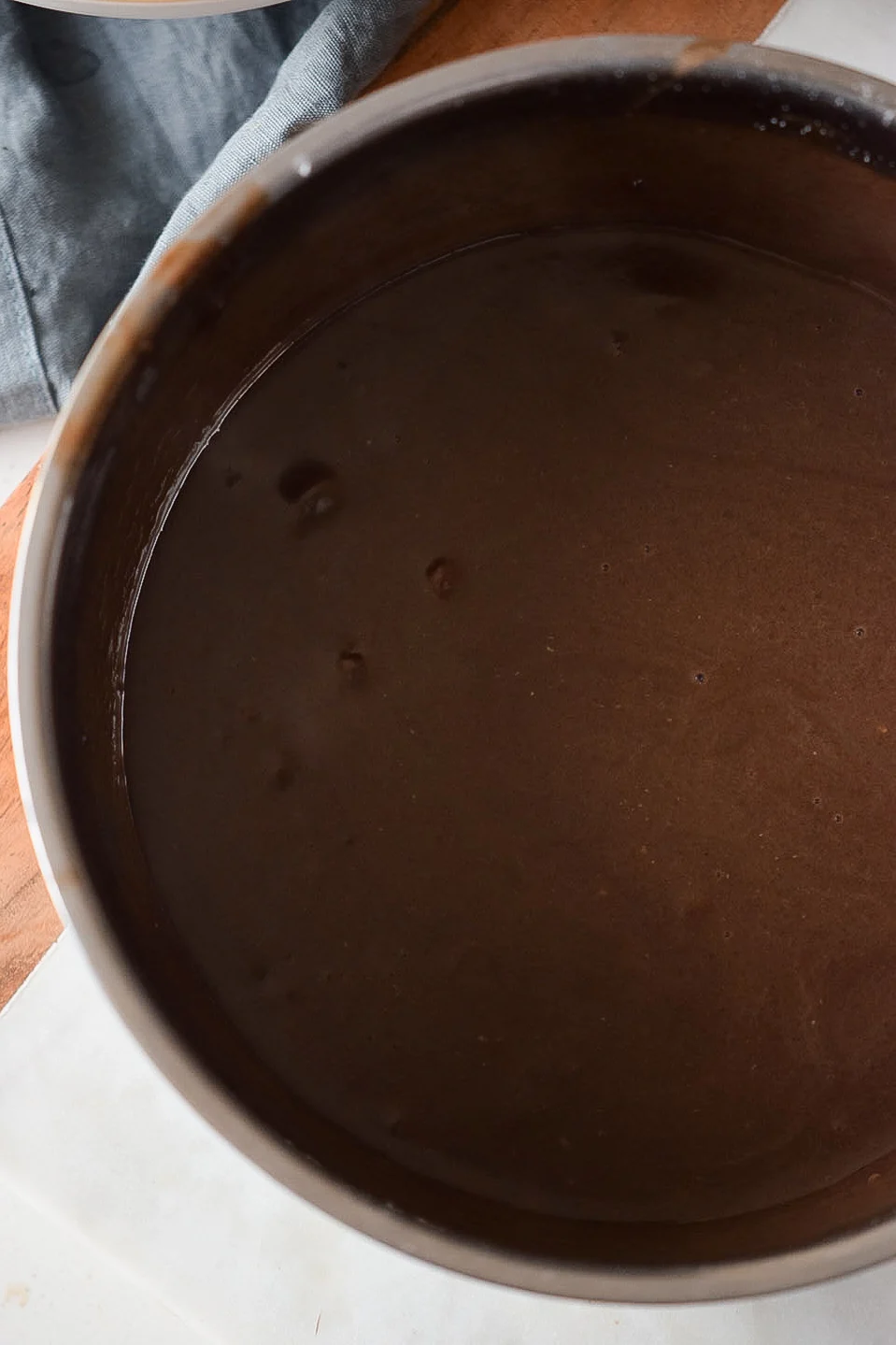 Better than boxed pudding, this easy homemade chocolate pudding is made with a few simple ingredients, plus a special ingredient, crushed cookies. Use this pudding recipe for pie filling and frozen pudding pops!