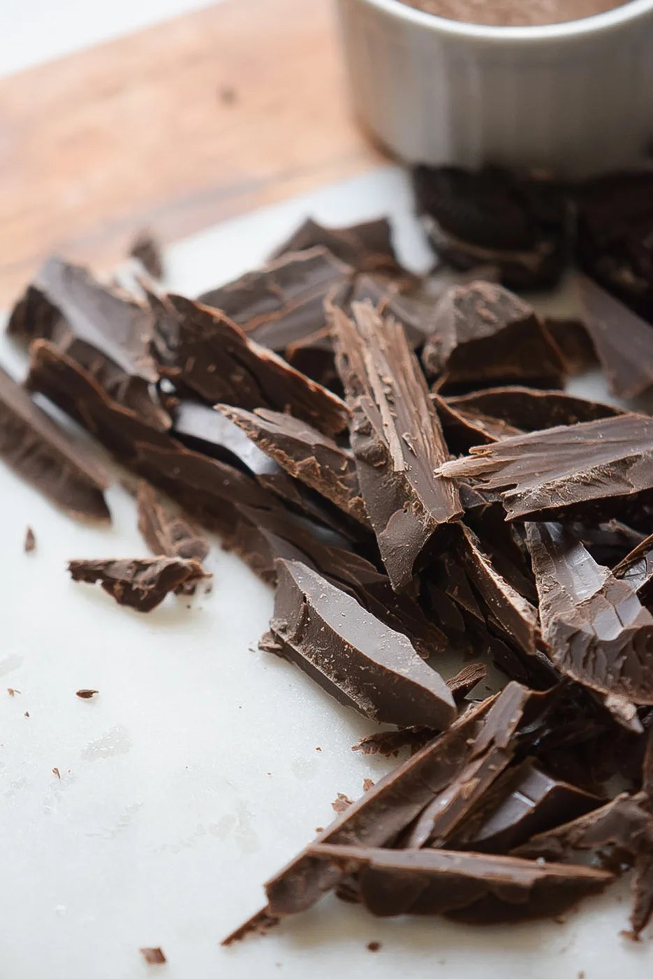 Better than boxed pudding, this easy homemade chocolate pudding is made with a few simple ingredients, plus a special ingredient, crushed cookies. Use this pudding recipe for pie filling and frozen pudding pops!