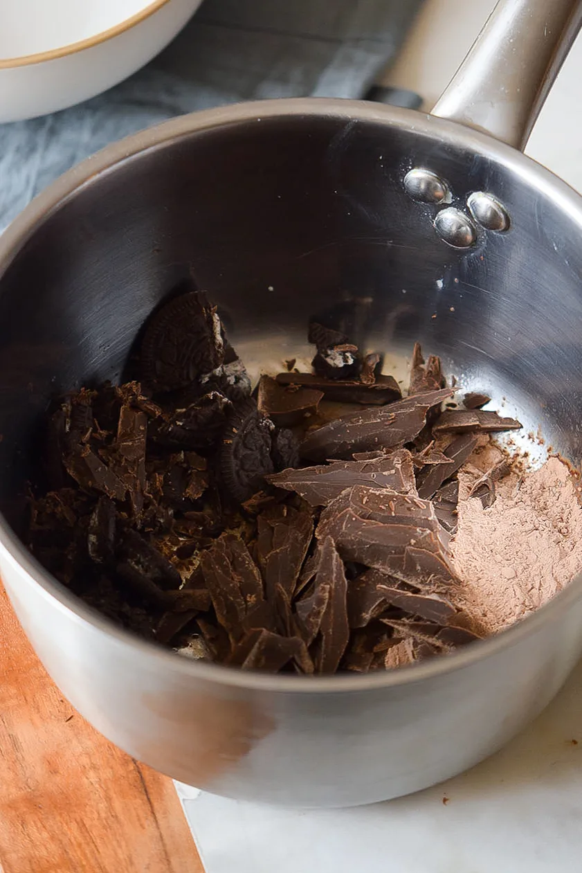 Better than boxed pudding, this easy homemade chocolate pudding is made with a few simple ingredients, plus a special ingredient, crushed cookies. Use this pudding recipe for pie filling and frozen pudding pops!