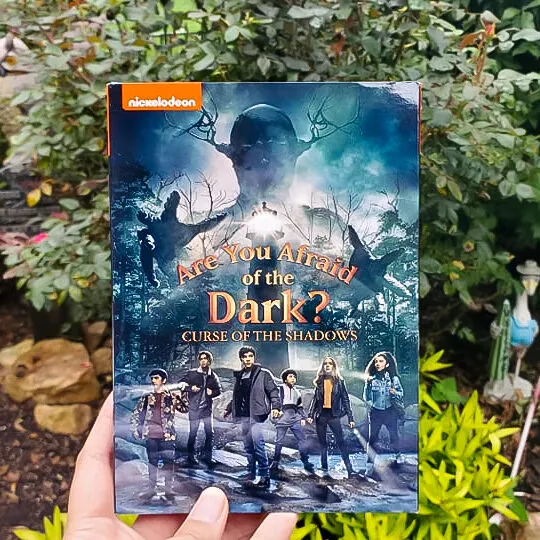 A new setting and a new Midnight Society bring fresh scares when the group&rsquo;s leader suddenly vanishes, prompting the remaining members to search for clues, confront dark forces, and ultimately uncover the truth behind their seaside town&rsquo;s terrifying curse. Are You Afraid of the Dark?: Curse of the Shadows, is now available on DVD!