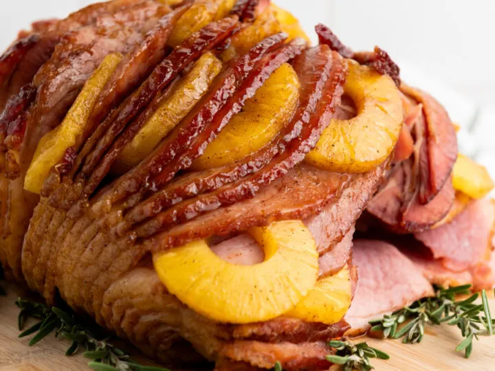 This Brown Sugar Pineapple Baked Ham is the ultimate easy holiday recipe for any celebration. Juicy, tender, and glazed to perfection, it&rsquo;s the best baked ham recipe to serve as your centerpiece for Christmas, Easter, or holiday parties. With just a few simple steps, you&rsquo;ll have a stunning holiday entree that everyone will love!
