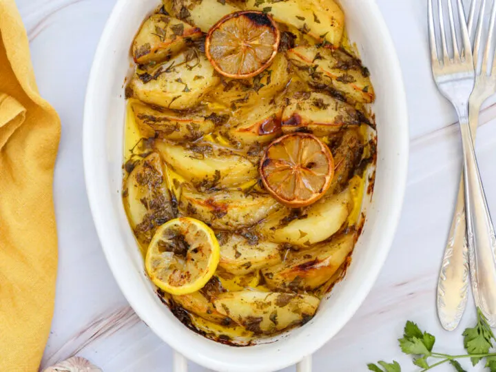 Bright, zesty, and so delicious, these Lemon Greek Potatoes are the side dish that everyone will love! With a crispy outside, fluffy inside, this easy make ahead recipe is perfect for holidays or everyday dinners.